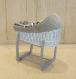 Cozy Grey Wicker Rocking Bassinet with White Stand – Plush Padded, Ideal for Infant Sleep & Nursery Decor